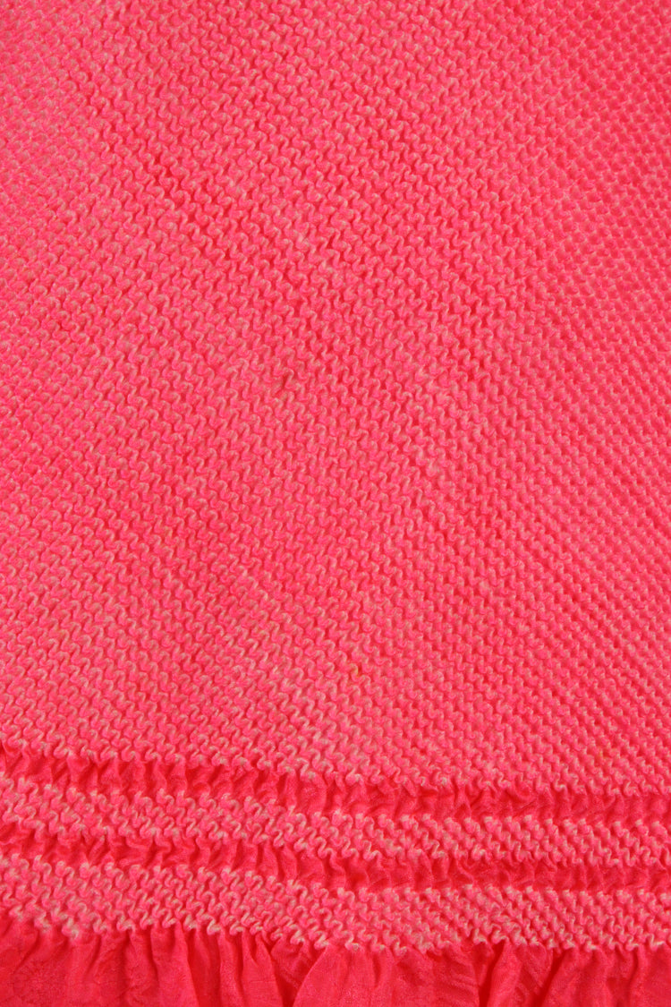 detail of thousands of shibori dots on vintage silk