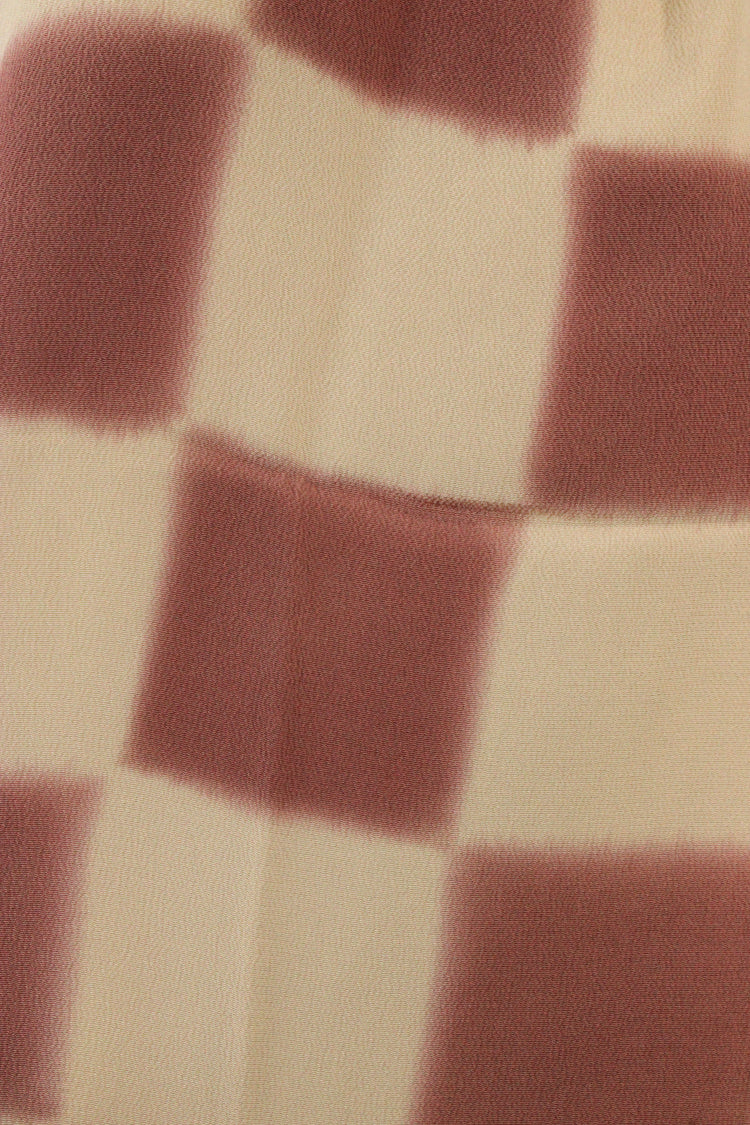 detail of vintage silk checkered scarf