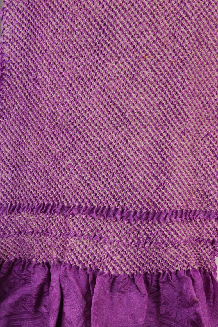 detail of many hand tied silk tufts on shibori scarf