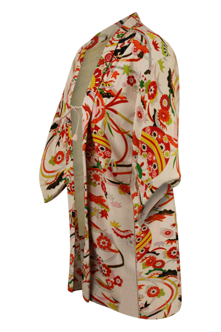 side view of red and white kimono jacket showing modified sleeves