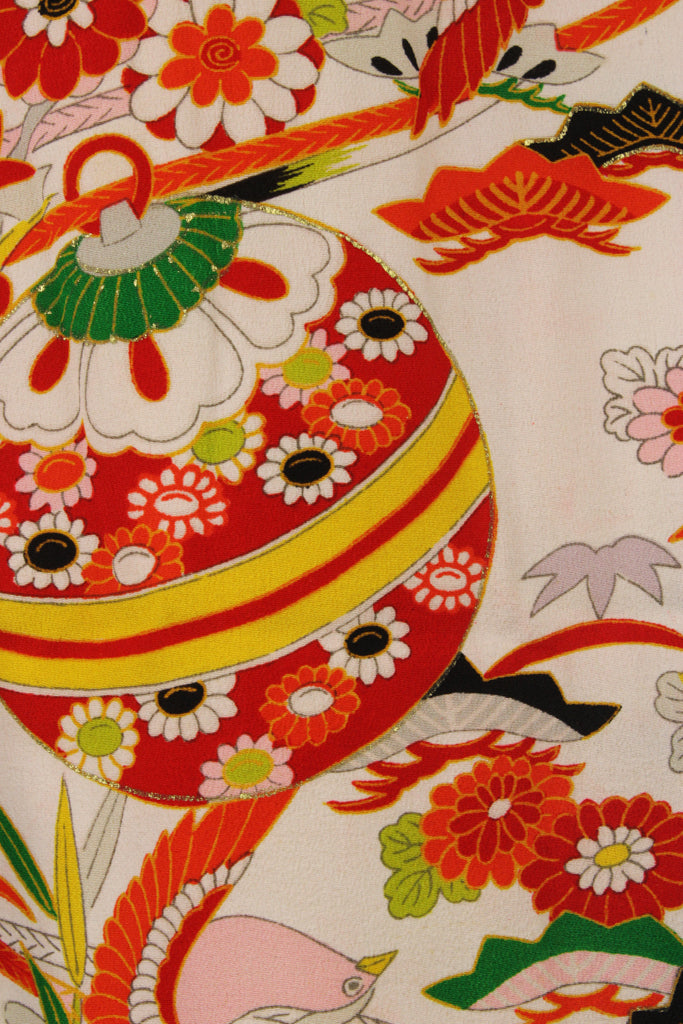 detail of hand painted design outlined in gold leaf from vintage silk kimono jacket