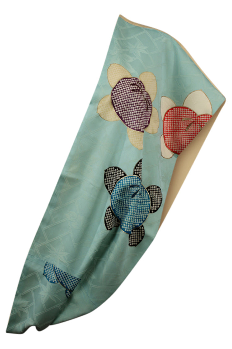 baby blue silk infinity scarf shown as a shoulder sash, refashioned from vintage kimono