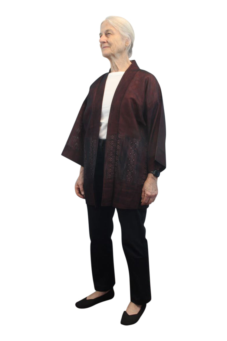 small woman in brown kimono jacket with refashioned reduced sleeves