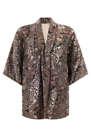 Woven metallic thread kimono jacket in browns silvers and blacks on large model