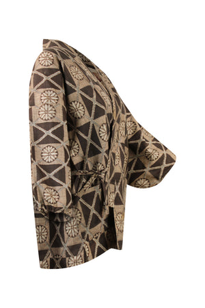 side view of tied vintage kimono jacket with brown ikat weave