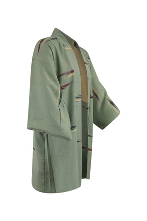 side view showing refashioned sleeves on mint green kimono jacket