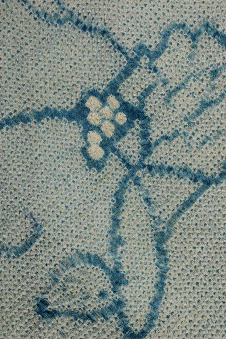 detail of the hundreds of raised dots on the shibori silk from kimono jacket
