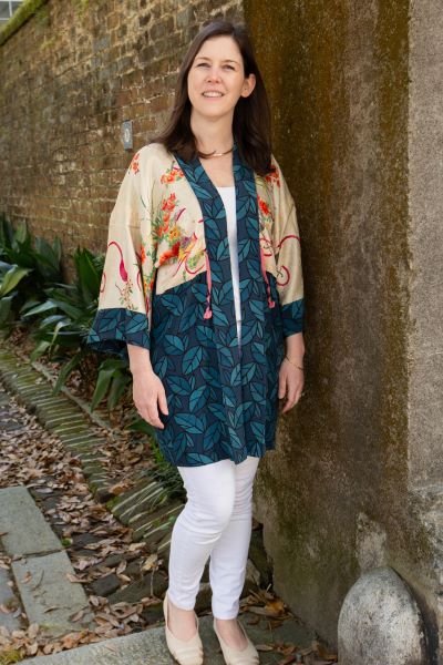 woman wearing reversible vintage kimono jacket in cream print and blues