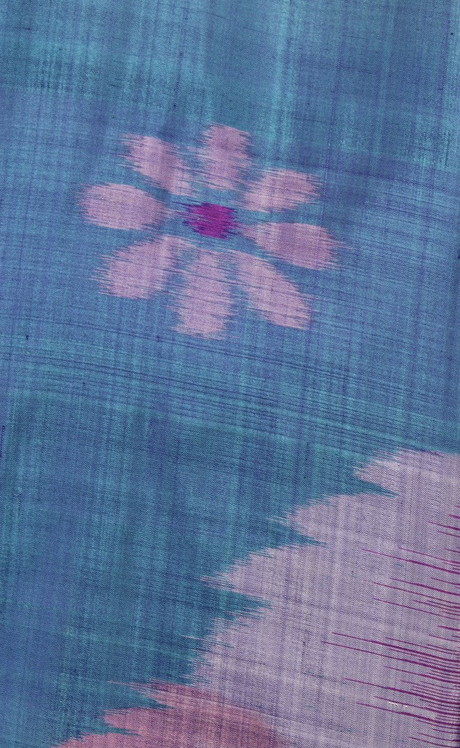 detail of blue ikat weave silk with pink floral design from vintage kimono jacket