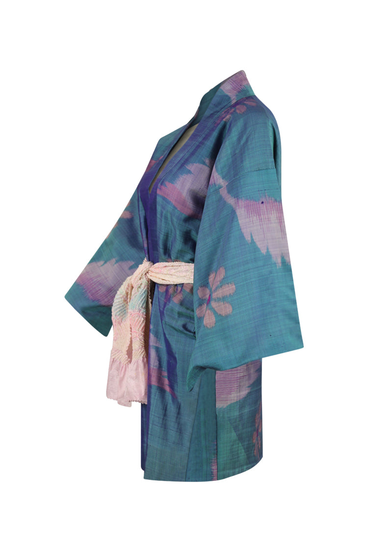 side view of blue and pink  vintage kimono jacket with pink sash