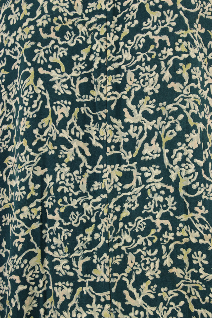details of hand stenciled vintage silk in slate blue and greens