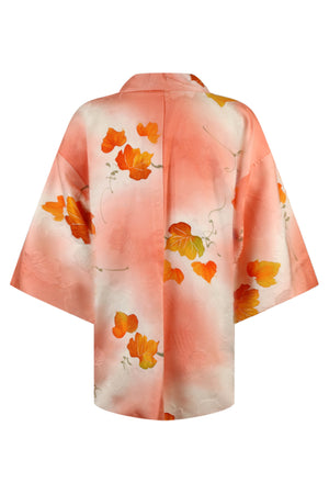 back view of variegated pink and white silk kimono jacket