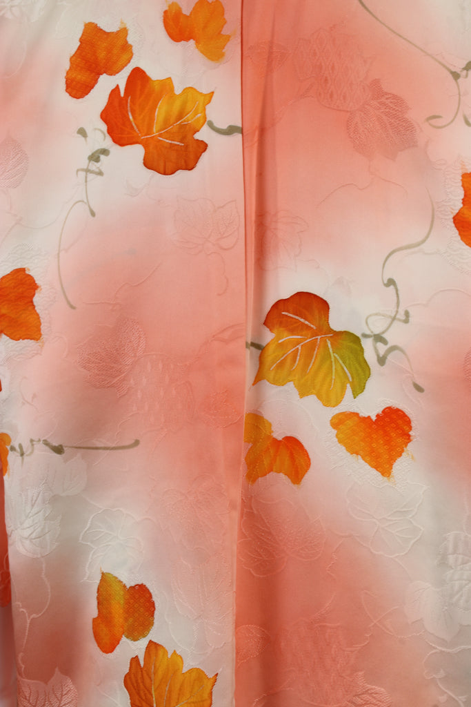 detail of hand painted maple leaves on vintage  silk kimono jacket