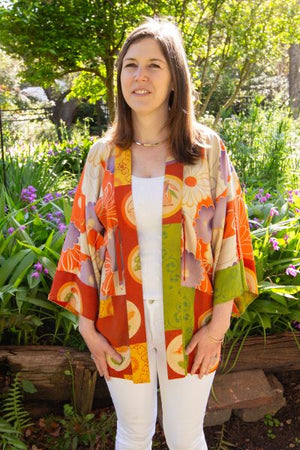 girl in reversible orange vintage silk kimono jacket