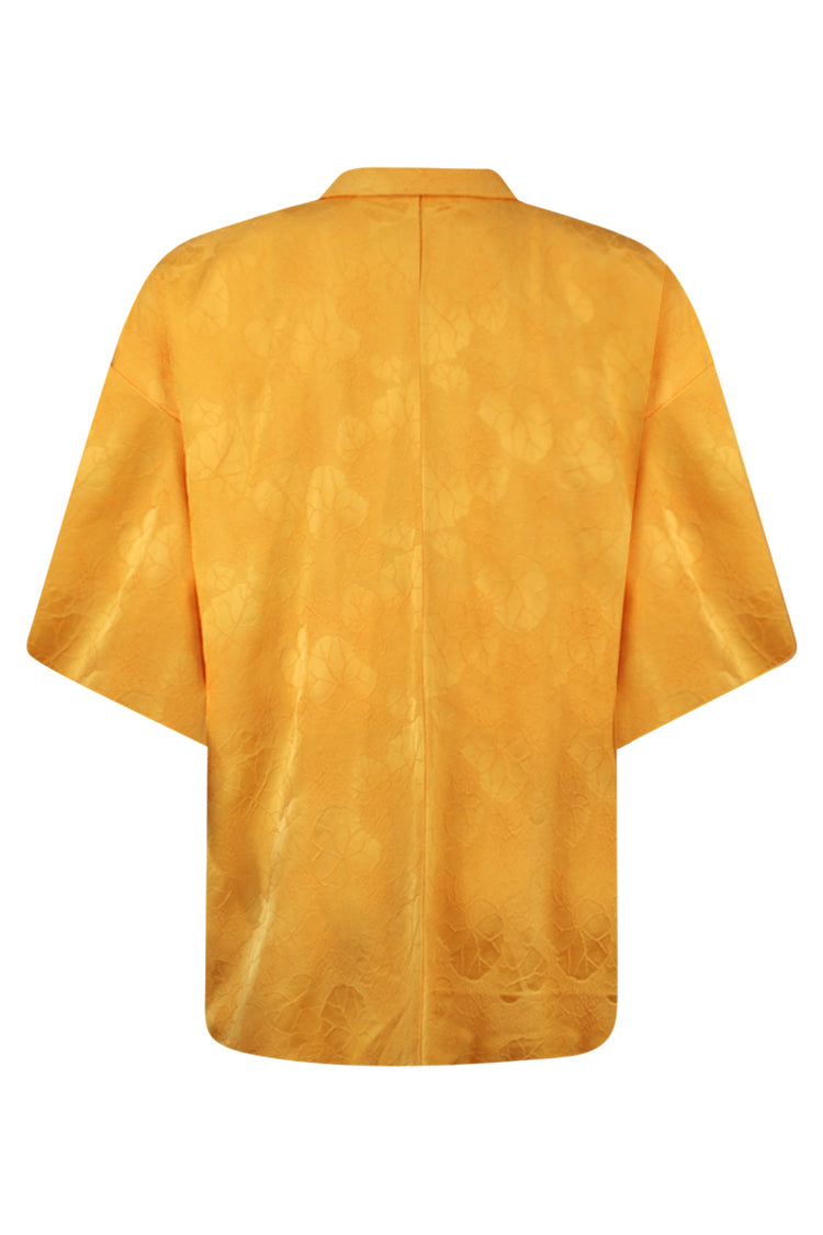 rear view of yellow vintage jacket with woven damask weave silk