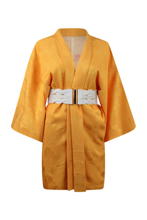 front view on small maodel of yellow kimono jacket with modeernized sleeves