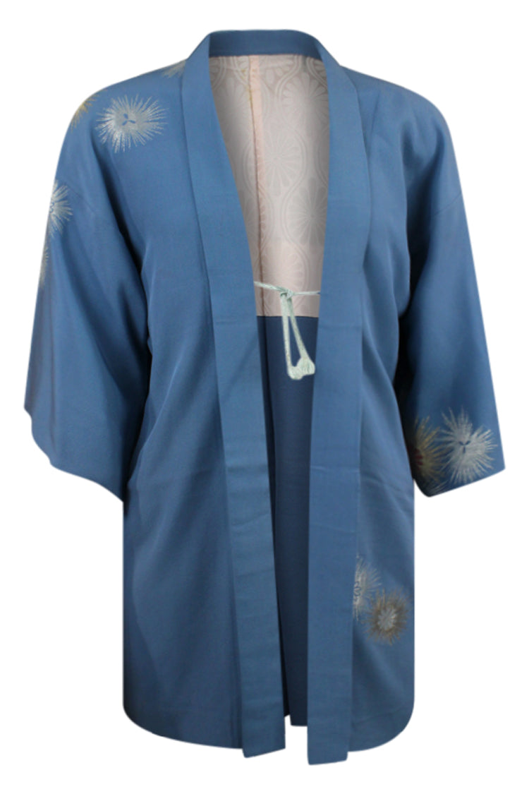 blue kimono jacket with woven flowers and modified sleeves