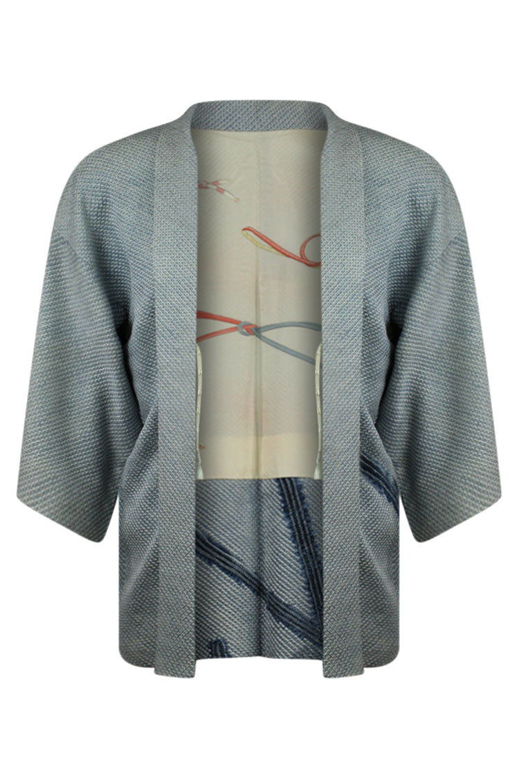 front view on large model of updated and upcycled kimono jacket with reduced sleeves