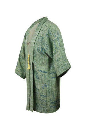 side view showing refashioned modernized sleeves of vintage kimono jacket in green silk