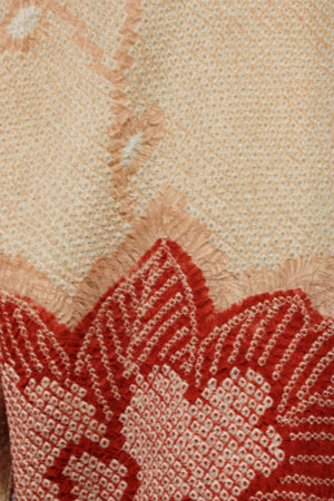 detail of shibori design on pink and dark coral silk from kimono jacket