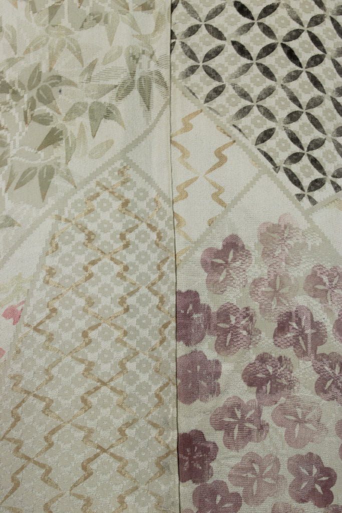 detail of damask weave vintage silk with hand painted abstract design
