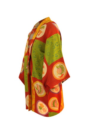 side view of orange kimono jacket with traditional design and refashioned modern sleeves