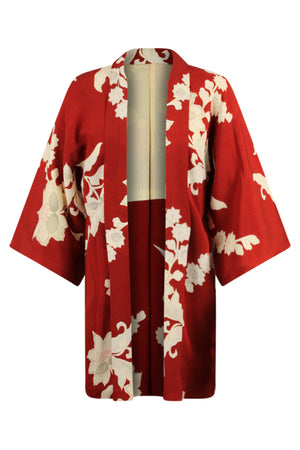 front view of long red kimono jacket with large white flowers