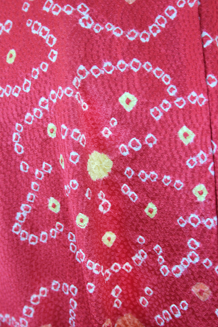 Coral  silk kimono coat with tie dyed design of yellow and orange dots