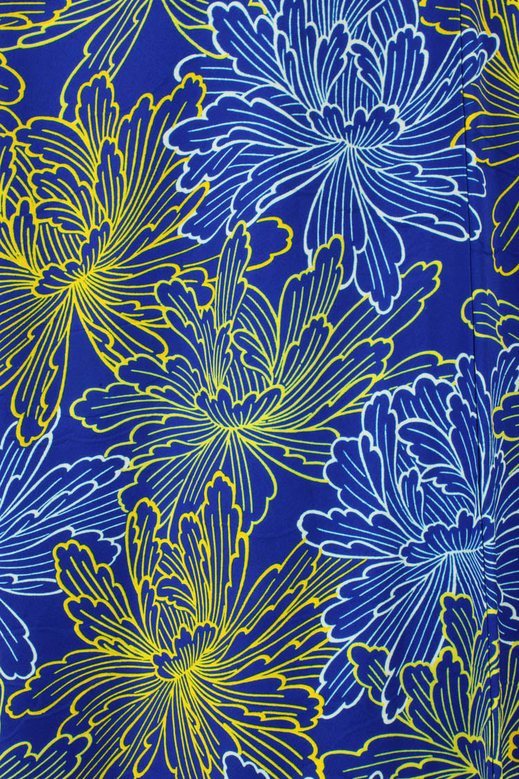detail of brilliant blue silk with floral design from vintage kimono
