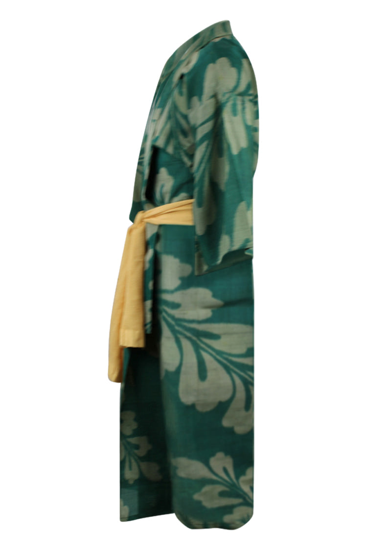 side view of green meisen silk vintage kimono refashioned with smaller sleeves