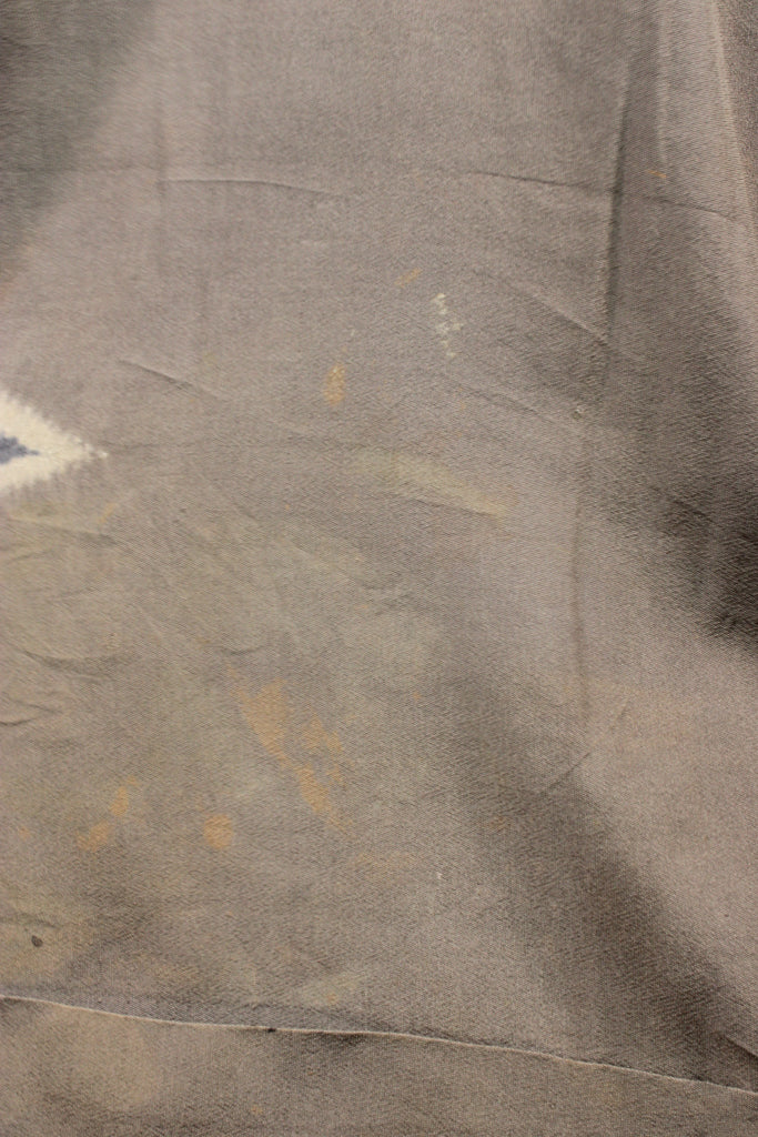 discoloration in vintage brown silk under kimono near hem