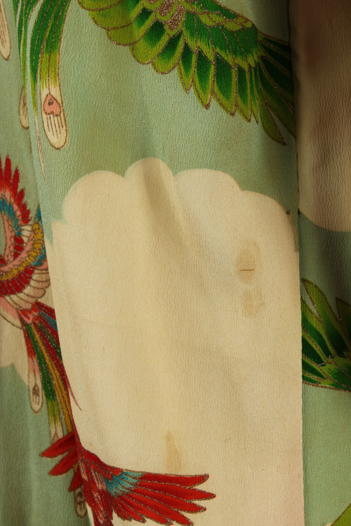 Inconspicuous spot on vintage green kimono
