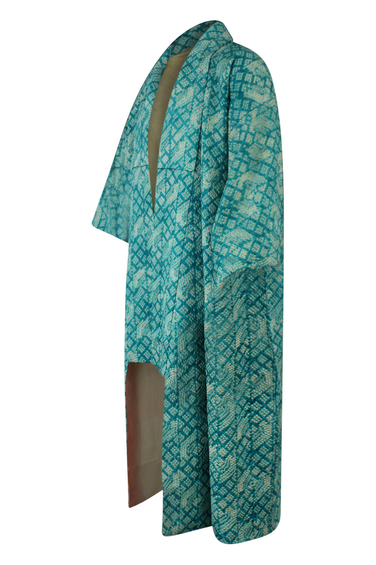 side view of upcycled elegant silk kimono in soft turquoise colors