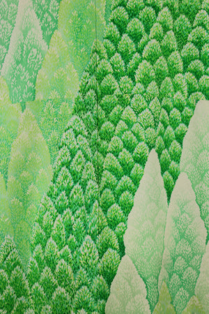 detail of silk from vintage kimono with green fir trees