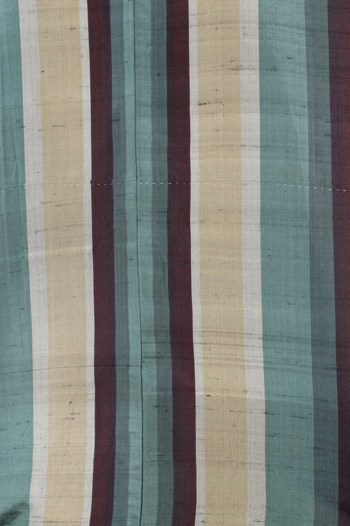 detail of striped turquoise brown and beige vintage silk