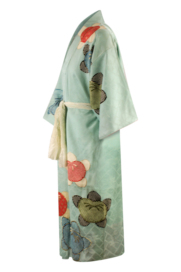 luxury silk kimono robe with traditional design on turquoise background and modern sleeves