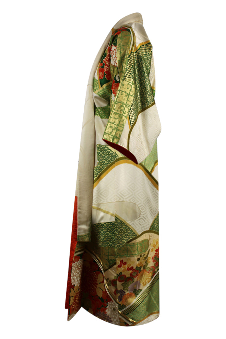 side of view of an elegant gold and green vintage kimono