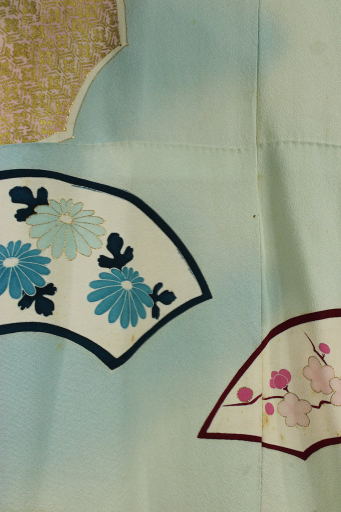 detail of seam and design match on blue silk kimono