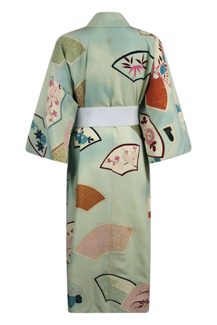 back view of elegant blue silk kimono on small model refashioned for modern wear