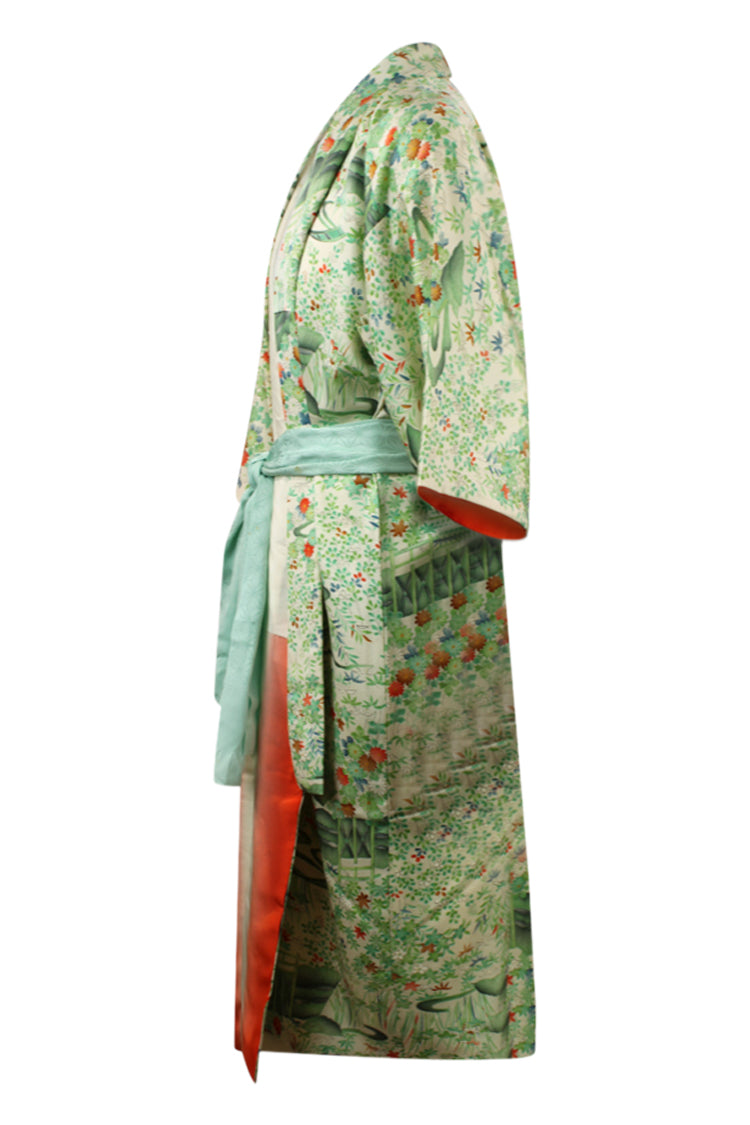 side view of refashioned green vintage kimono with reduced sleeves and shortened hem
