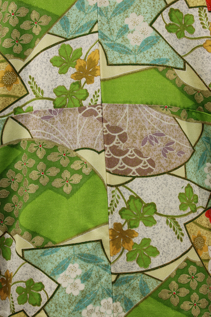 Detail of the exquisite hand painted designs on vintage silk kimono