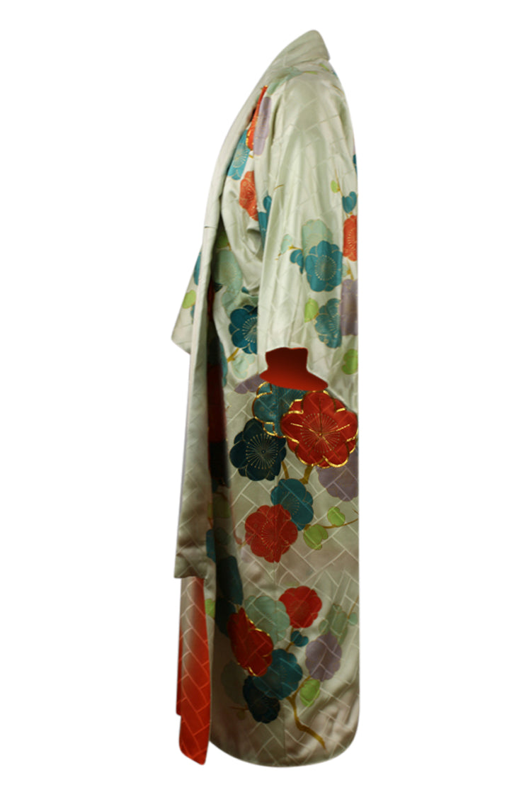 side view of pale green kimono with gold braid embroidery