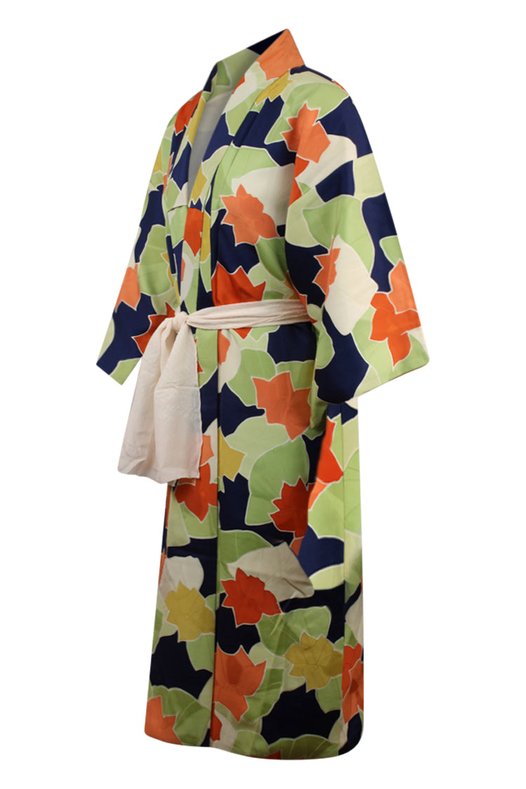 side view of colorful lime, navy and orange vintage kimono