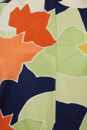 detail of vintage silk with maple leaf design