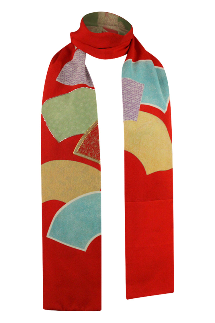 Orange narrow silk celebration scarf with colorful fans