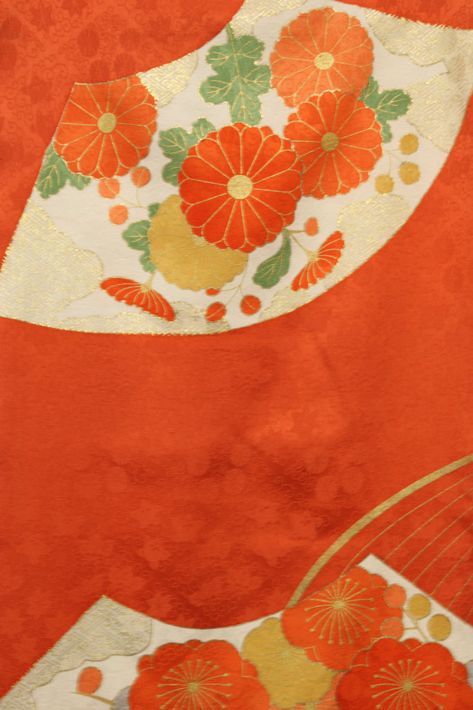hand painted flowers outline in gold on orange vintage kimono silk
