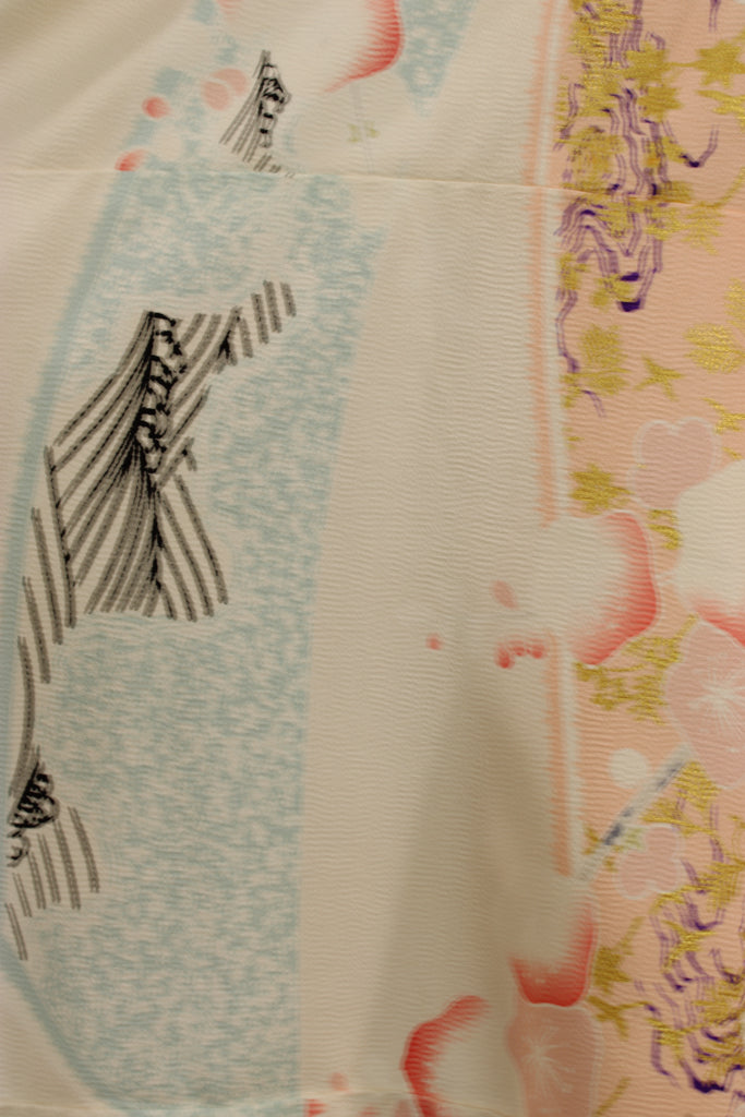 Pink silk caftan top with abstract design and gold embroidery