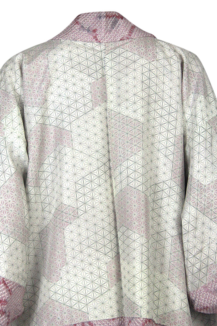 Patterned lining closeup of the inside silk jacket.