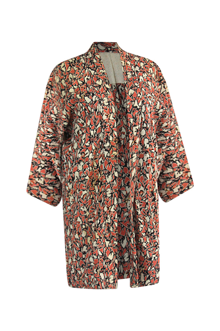 Three quarter ghost image view of Kiku fashion patterned silk black and peach jacket. 