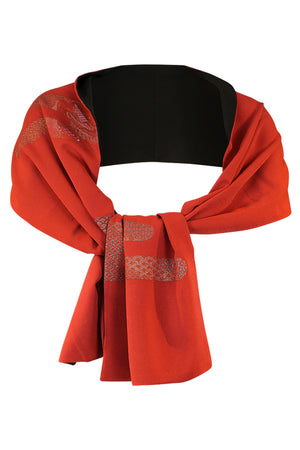 tied orange  stole with traditional design of woven gold threads